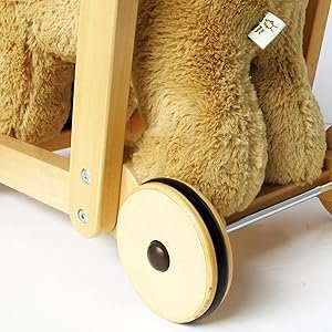 Close up showing sturdy wooden frame on dog baby walker